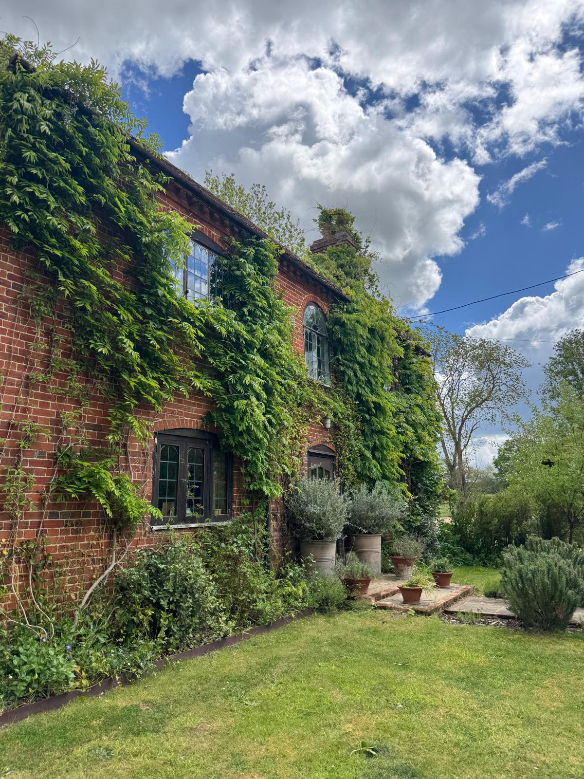Lee Country Farm House ivy-covered exterior